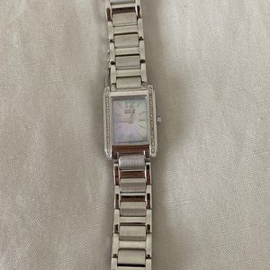 CITIZENS sterling silver watch with diamond chips/ mother of Pearl face.